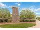 Providence community entrance monument with landscaping and trees in view at 7345 Chesapeake Cove St, Las Vegas, NV 89166