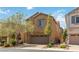 Charming two-story home with a two car garage and beautiful landscaping in a suburban neighborhood at 7345 Chesapeake Cove St, Las Vegas, NV 89166