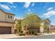 Charming two-story home with a two car garage and beautiful landscaping in a suburban neighborhood at 7345 Chesapeake Cove St, Las Vegas, NV 89166