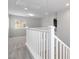 A view from the staircase landing looking into another room at 7345 Chesapeake Cove St, Las Vegas, NV 89166