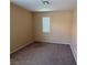 Modest bedroom with a window for natural light and carpeted floors at 8708 Gateway Glen Dr, Las Vegas, NV 89178