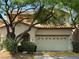 Charming two-story home with a well-maintained front yard and two car garage at 8708 Gateway Glen Dr, Las Vegas, NV 89178