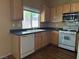 View of a bright and functional kitchen with essential appliances and ample counter space at 8708 Gateway Glen Dr, Las Vegas, NV 89178