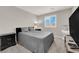 Bedroom with a bed, window with shutters, and gray walls at 872 Pointe Arbor St, Henderson, NV 89011