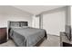 Bedroom with a large bed, closet, and dresser at 872 Pointe Arbor St, Henderson, NV 89011