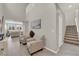 Bright entryway with high ceilings, tile flooring, and staircase at 872 Pointe Arbor St, Henderson, NV 89011