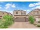Charming two-story home with brick driveway and well-maintained landscaping at 872 Pointe Arbor St, Henderson, NV 89011