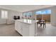 Spacious open-concept kitchen and living room area with outdoor access at 872 Pointe Arbor St, Henderson, NV 89011