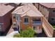 Bird's eye view of the home featuring a balcony and proximity to desert landscaping and neighborhood at 9032 Retro Ct, Las Vegas, NV 89149
