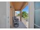 Private balcony with comfortable seating and views of the surrounding landscape at 9032 Retro Ct, Las Vegas, NV 89149