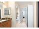 Bathroom featuring granite countertops, tile flooring and access to the commode and shower at 9032 Retro Ct, Las Vegas, NV 89149