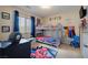 Playful bedroom with bunkbeds and superhero-themed decor at 9032 Retro Ct, Las Vegas, NV 89149