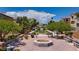 Well-maintained community space featuring benches, trees, and landscaped grounds perfect for relaxation and gatherings at 9032 Retro Ct, Las Vegas, NV 89149