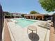 Beautiful community pool featuring ample lounge chairs and a shaded pavilion at 9869 Lime Tree St, Las Vegas, NV 89178