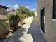 Private backyard showcasing a concrete patio area perfect for outdoor entertaining and leisure at 10118 Farmington Hall Ct, Las Vegas, NV 89129