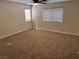 Bedroom with carpet, a ceiling fan, and windows to bring in lots of light at 10118 Farmington Hall Ct, Las Vegas, NV 89129