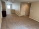 Spacious upstairs bonus room with neutral carpet, natural light and an entry door at 10118 Farmington Hall Ct, Las Vegas, NV 89129