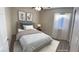 Cozy bedroom with natural light, window and carpeted floors, virtually staged with decor at 10321 Birch Bluff Ln, Las Vegas, NV 89145