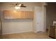 Bright dining area with overhead cabinets, providing ample storage space and convenience at 10321 Birch Bluff Ln, Las Vegas, NV 89145