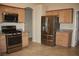 Modern kitchen features stainless steel appliances, granite countertops, and ample storage space at 10321 Birch Bluff Ln, Las Vegas, NV 89145
