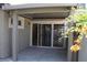 Covered patio with sliding glass doors, offering seamless indoor-outdoor living at 10321 Birch Bluff Ln, Las Vegas, NV 89145