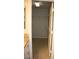 Walk-in closet adjacent to bathroom, offering shelving and storage solutions at 10321 Birch Bluff Ln, Las Vegas, NV 89145