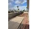 This backyard offers concrete and dirt areas ready for landscaping, with palm trees adding to its potential at 105 Huntly Rd, Las Vegas, NV 89145