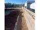 Spacious backyard featuring gravel and a tall cinderblock wall at 105 Huntly Rd, Las Vegas, NV 89145
