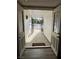 Inviting entryway with double doors, security gate and welcome mat at 105 Huntly Rd, Las Vegas, NV 89145