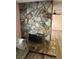 Close up of the unique stone fireplace feature in the living room at 105 Huntly Rd, Las Vegas, NV 89145