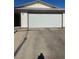 Attached two car garage providing convenient parking and additional storage options at 105 Huntly Rd, Las Vegas, NV 89145