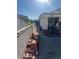 View of side yard area with block wall and access to back patio at 105 Huntly Rd, Las Vegas, NV 89145