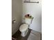 Standard white toilet with a clean, minimalist design in a bright bathroom at 105 Huntly Rd, Las Vegas, NV 89145