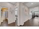 Bright hallway offers easy access to the bathroom, office, and main living area at 1120 Via Della Curia, Henderson, NV 89011