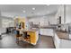 Beautiful kitchen featuring granite countertops, a center island, and white cabinets at 1120 Via Della Curia, Henderson, NV 89011