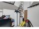 Unfinished utility room featuring a water softener, water heater, and various equipment at 1120 Via Della Curia, Henderson, NV 89011