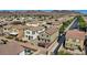 Aerial view of a two-story home featuring a backyard with a patio and trampoline at 1266 Smokey Valley Ln, Henderson, NV 89002