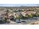 An aerial view of a two-story home nestled in a well-maintained neighborhood at 1266 Smokey Valley Ln, Henderson, NV 89002
