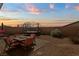 Backyard with sunset views, trampoline and outdoor seating area at 1266 Smokey Valley Ln, Henderson, NV 89002