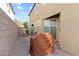 Side yard with patio pavers and gravel at 1266 Smokey Valley Ln, Henderson, NV 89002