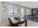 Inviting dining area with backyard access offering natural light and an open atmosphere at 1266 Smokey Valley Ln, Henderson, NV 89002