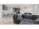 Open floor plan with kitchen, dining, and living areas, and ample space for entertaining at 1266 Smokey Valley Ln, Henderson, NV 89002