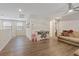 Bright upper living room with wood floors, shiplap accent wall and comfortable seating perfect for relaxing and entertaining at 1266 Smokey Valley Ln, Henderson, NV 89002