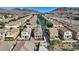 Beautiful neighborhood view with mountain views in the background on a sunny day at 1266 Smokey Valley Ln, Henderson, NV 89002