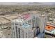 Stunning aerial view of a high-rise condo building with a rooftop pool and city views at 150 Las Vegas Blvd # 2115, Las Vegas, NV 89101