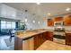 Open concept kitchen featuring stainless appliances, granite countertops, and a breakfast bar at 150 Las Vegas Blvd # 2115, Las Vegas, NV 89101
