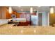 This kitchen offers granite countertops, stainless appliances, and wood cabinets for a modern feel at 150 Las Vegas Blvd # 2115, Las Vegas, NV 89101