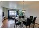 Cozy living room with hardwood floors, comfortable seating, and large windows showcasing city views at 150 Las Vegas Blvd # 2115, Las Vegas, NV 89101