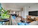 Open-concept living room flows into the dining area and kitchen, with hardwood flooring at 150 Las Vegas Blvd # 2115, Las Vegas, NV 89101