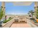 Rooftop outdoor kitchen with built-in stainless grill and bar fridge plus desert views at 150 Las Vegas Blvd # 2115, Las Vegas, NV 89101